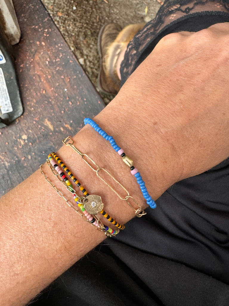 Antique bead and molten gold bracelet